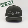 Green cap with 'Sunday Stroll' text on a gray background, featuring a pre-order stamp.