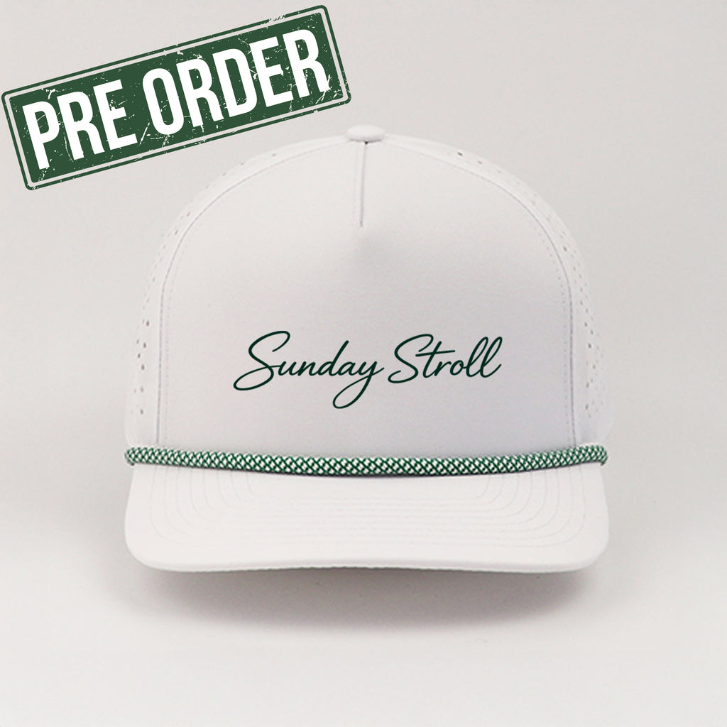 White cap with 'Sunday Stroll' text and green trim on a light gray background, with a 'Pre Order' label.